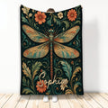 Ornate dragonfly throw blanket with mosaic-inspired wings, flowers, and botanical vines