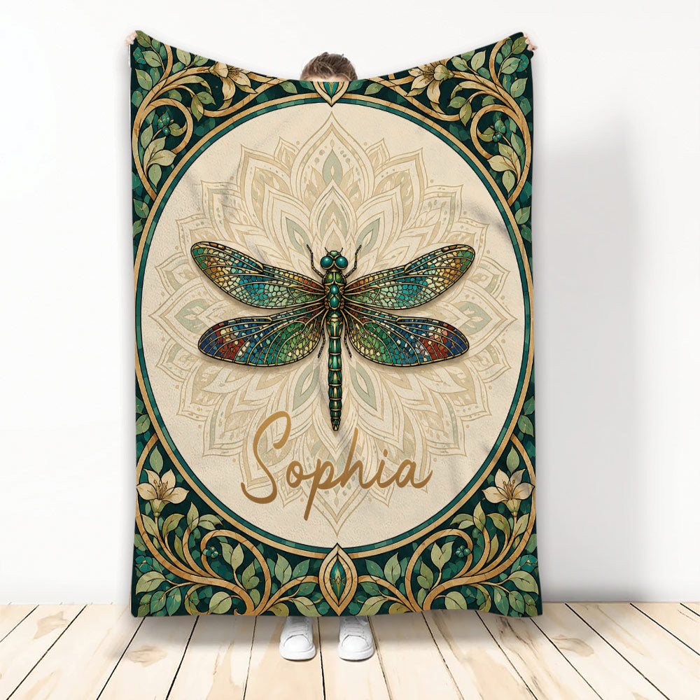 Ornate dragonfly blanket displayed upright with stained-glass-inspired wings and botanical border