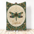 Ornate dragonfly blanket displayed upright with stained-glass-inspired wings and botanical border