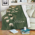 Sheep throw blanket draped over a sofa with rustic green artwork and cozy room decor