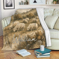 Sheep throw blanket draped over a sofa, showing a rustic grazing flock landscape
