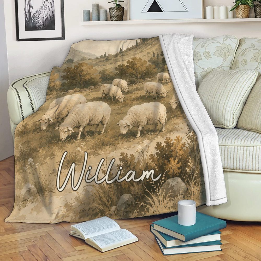 Sheep throw blanket draped over a sofa, showing a rustic grazing flock landscape