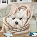 Westie blanket draped over a sofa featuring a detailed white terrier face and cozy neutral artwork