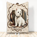 Westie throw blanket featuring a white West Highland Terrier, paw prints, plaid fabric, and rustic leather artwork