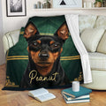 Miniature Pinscher throw blanket draped over a sofa in a cozy living room setting
