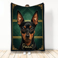 Black and tan Miniature Pinscher blanket displayed upright with dark green geometric and gold ornamental artwork