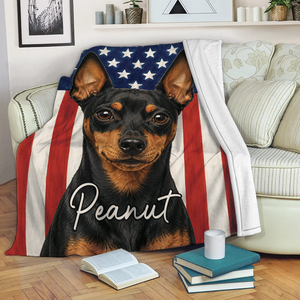 Patriotic Miniature Pinscher throw blanket displayed on a sofa with a bold dog design