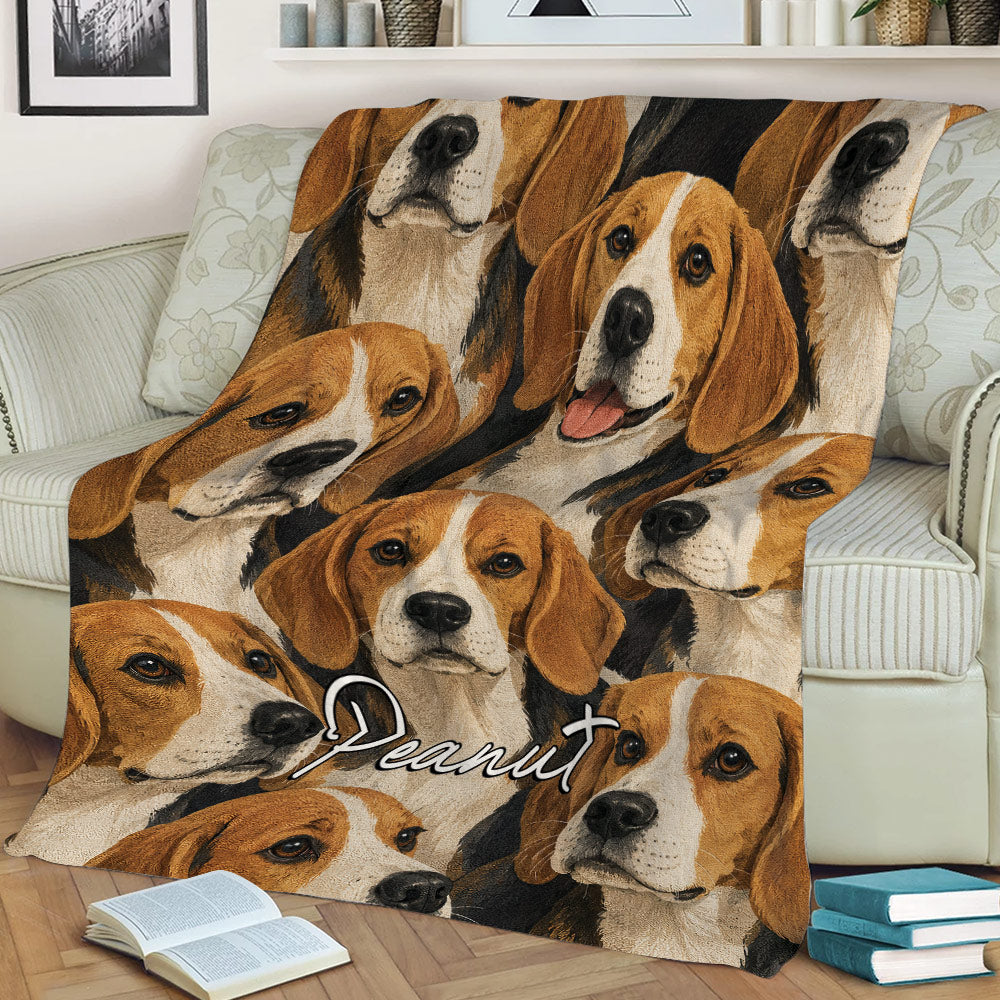 Close view of a beagle blanket spread across a sofa, featuring a repeating dog portrait design