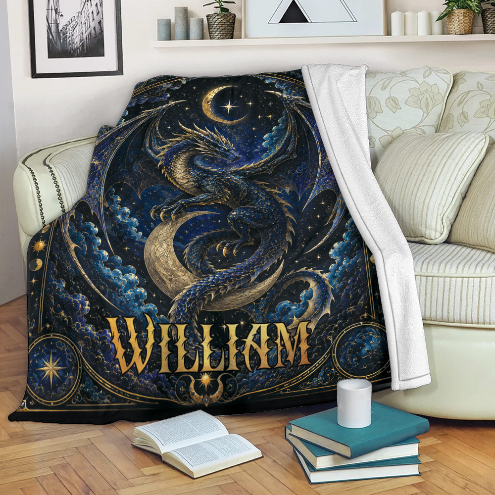 Blue and gold dragon throw blanket draped over a sofa with celestial artwork, clouds and moon details