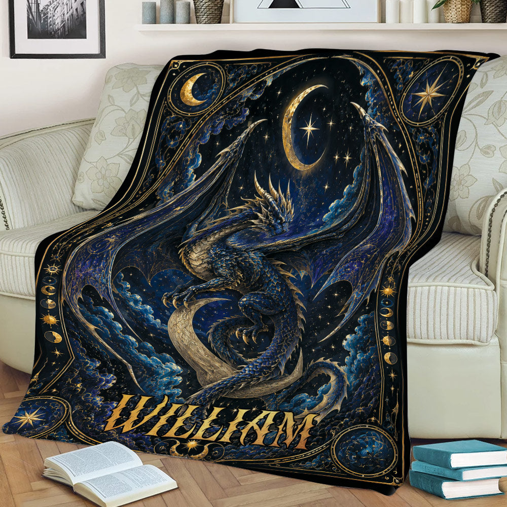 Ornate dragon throw blanket spread across a sofa with dark blue fantasy artwork and golden celestial accents