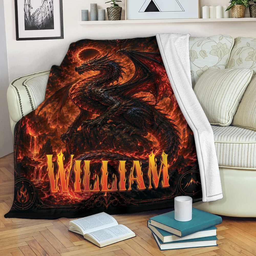 Dark dragon throw blanket draped over a sofa with glowing red fantasy artwork