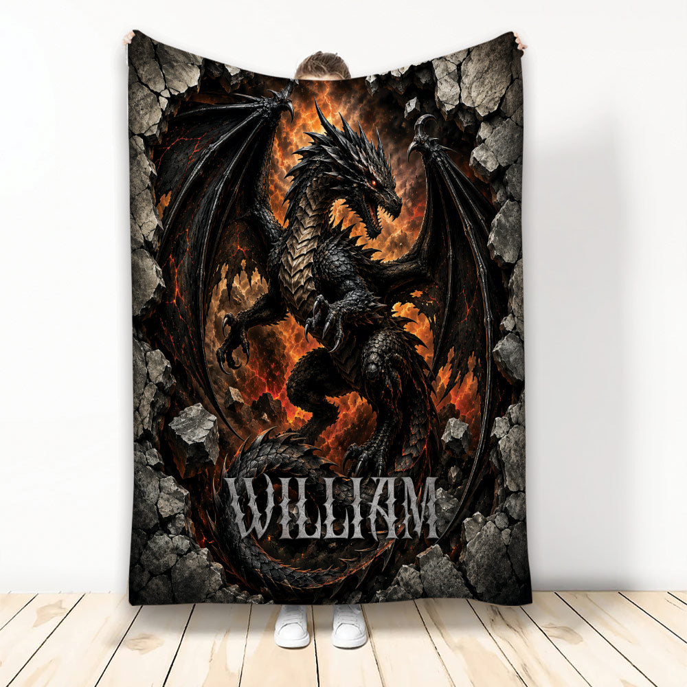 Black dragon throw blanket with fiery fantasy artwork and rocky border displayed by a person