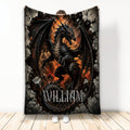 Black dragon throw blanket with fiery fantasy artwork and rocky border displayed by a person