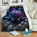 DJ throw blanket displayed on a sofa with turntables, headphones, speakers, and concert lighting artwork