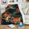 DJ throw blanket draped over a sofa with turntable and vinyl record artwork in a cozy living room