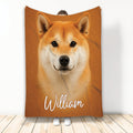 Orange Shiba Inu artwork blanket displayed upright with a close-up dog face
