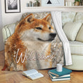 Shiba Inu throw blanket displayed on a sofa with artistic textured dog design