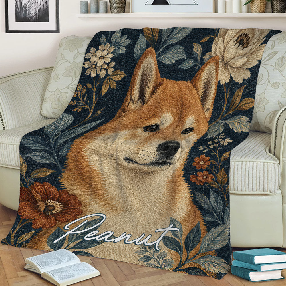 Shiba Inu throw blanket displayed on a sofa with detailed floral and leafy artwork