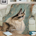Ragdoll cat throw blanket displayed on a sofa with detailed long-haired cat artwork and teal accents