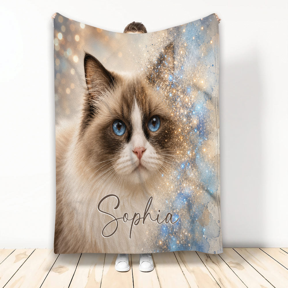 Ragdoll cat throw blanket with blue eyes, soft cream fur, and dreamy blue sparkle artwork