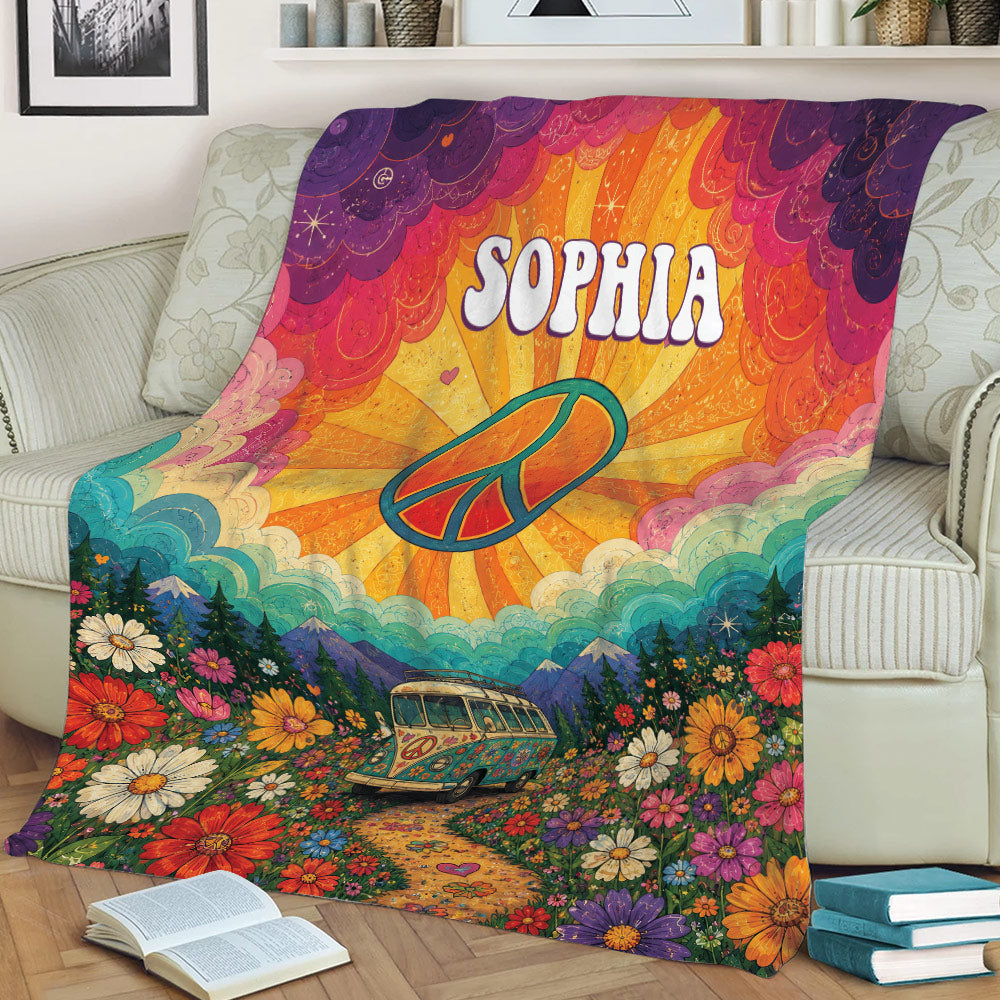 Colorful hippie blanket displayed on a sofa with peace symbol, vintage van and psychedelic floral artwork