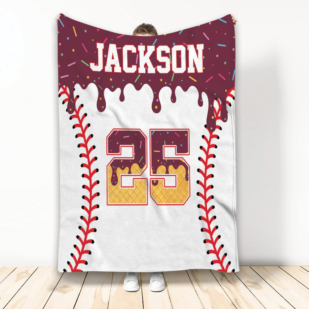 Baseball throw blanket displayed upright with red baseball seams, colorful confetti accents, and a bold jersey-style number