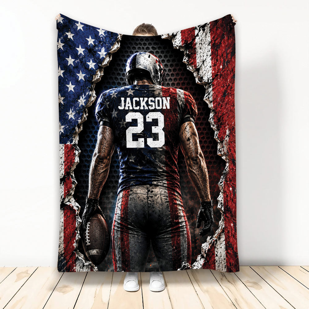 Custom football blanket featuring a player holding a football in bold red, white, blue, and black artwork