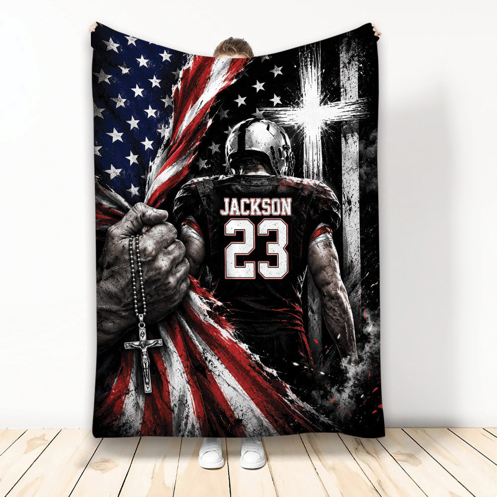 Football throw blanket with helmeted player, patriotic flag artwork, and bold red, white, and blue design