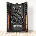 Fishing throw blanket with crossed hooks, rugged metal texture, and patriotic border artwork