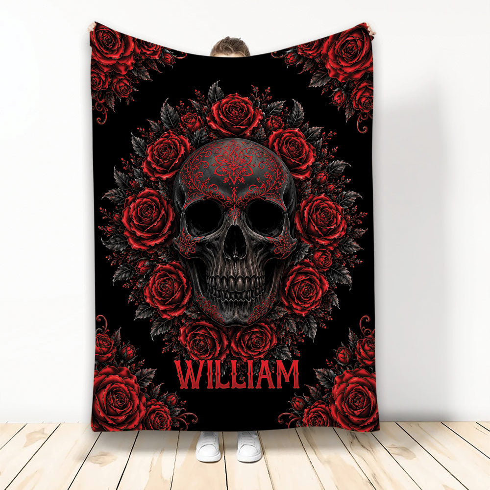 Skull throw blanket with ornate red rose artwork on a black background