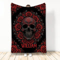 Skull throw blanket with ornate red rose artwork on a black background