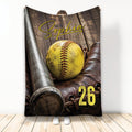 Softball blanket featuring a yellow softball, bat, leather glove, and rustic wood sports background