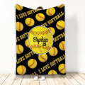 Softball throw blanket with yellow softball pattern and bold black and gold sports artwork