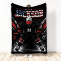 Hockey throw blanket featuring a goalie in black and red gear with bold patriotic sports artwork
