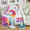 Volleyball throw blanket draped over a sofa with colorful player silhouette and artistic ball design