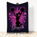 Cheerleading throw blanket with cheerleader silhouette, pom-poms, pink stars, and bold purple artwork
