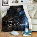 Welder blanket displayed on a sofa with welding sparks and industrial artwork