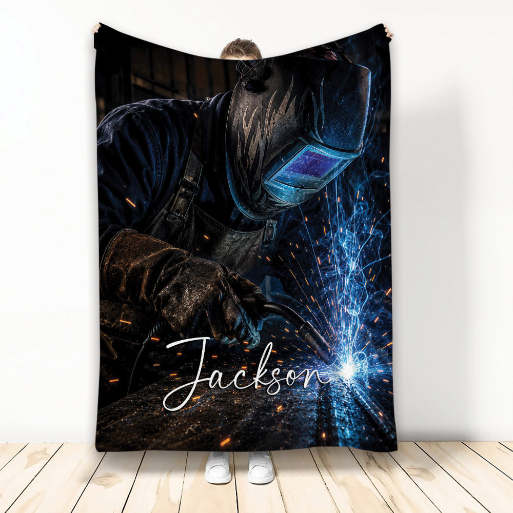 Welder throw blanket featuring protective gear, welding sparks, and dramatic dark workshop artwork
