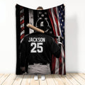 Baseball throw blanket featuring a helmeted batter silhouette and distressed American flag artwork