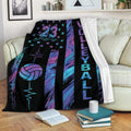 Colorful volleyball throw blanket draped over a sofa with bold sports artwork and abstract stripes