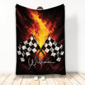 Racing blanket with crossed black and white checkered flags over a fiery black and red background