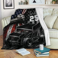 Dirt track racing blanket draped over a sofa with bold sprint car and patriotic artwork