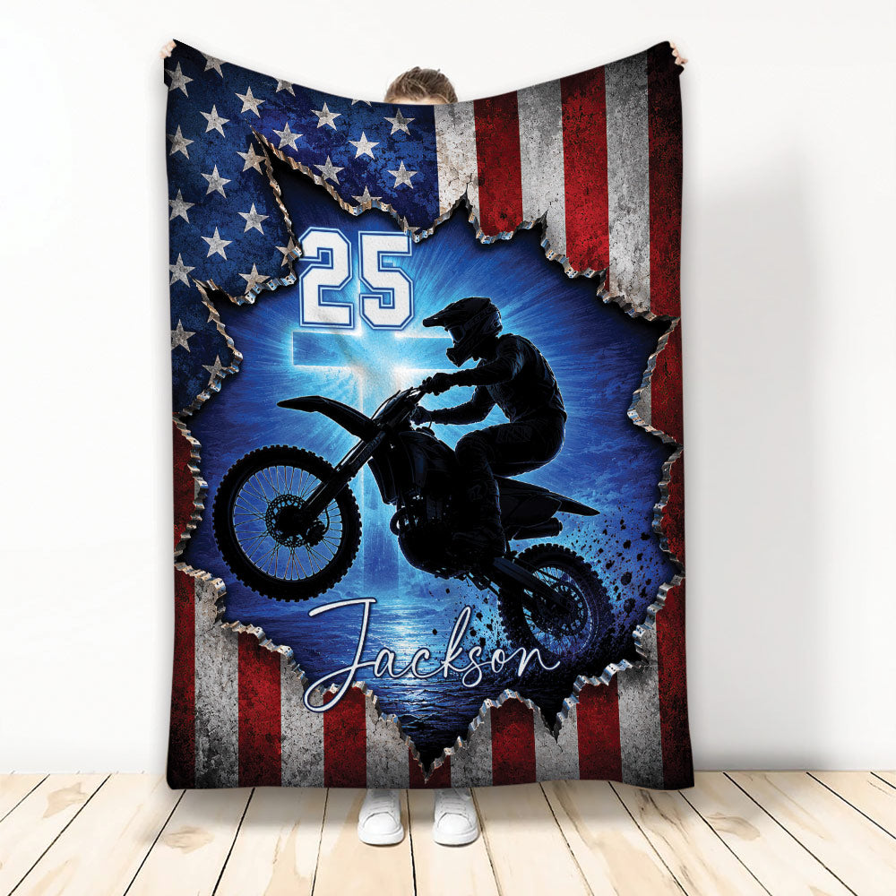 Motocross throw blanket with dirt bike rider, blue racing scene, and distressed American flag artwork