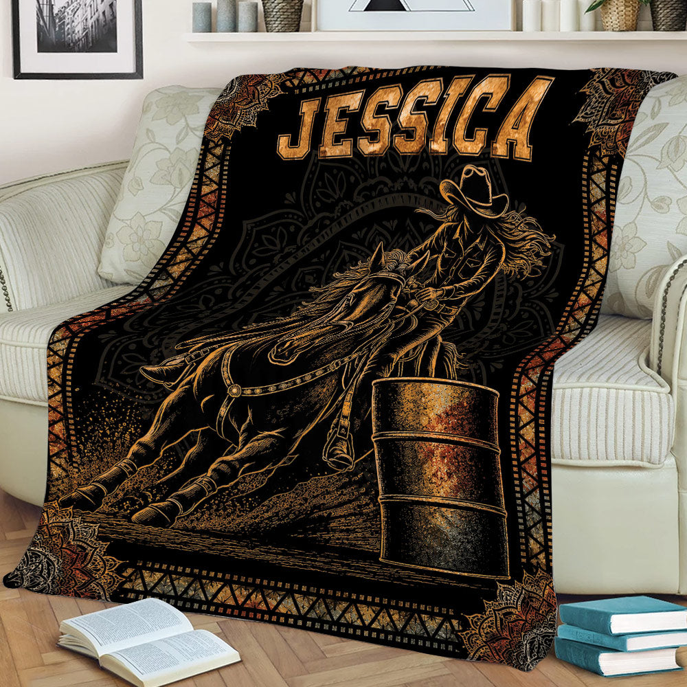 Western barrel racing blanket displayed on a couch with dramatic horse-and-rider artwork