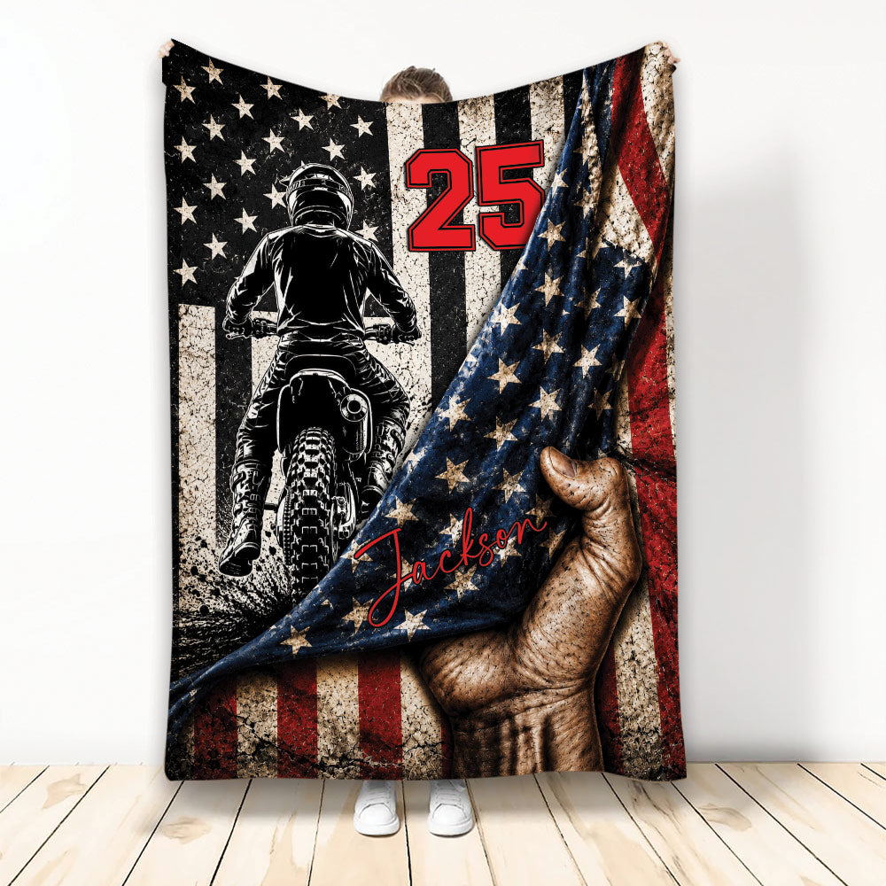 Motocross throw blanket featuring a dirt bike rider and distressed patriotic star and stripe artwork