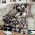 Miniature Schnauzer blanket draped across a sofa, featuring close-up gray and black dog artwork