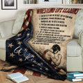 Wrestling blanket draped over a couch with an illustrated wrestler and vintage patriotic design