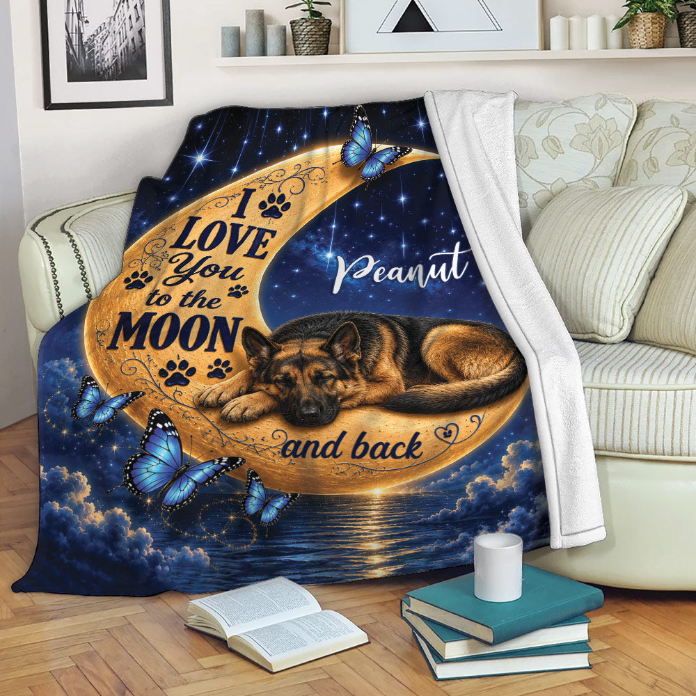German Shepherd blanket displayed on a sofa with moonlit artwork, stars, clouds and blue butterflies