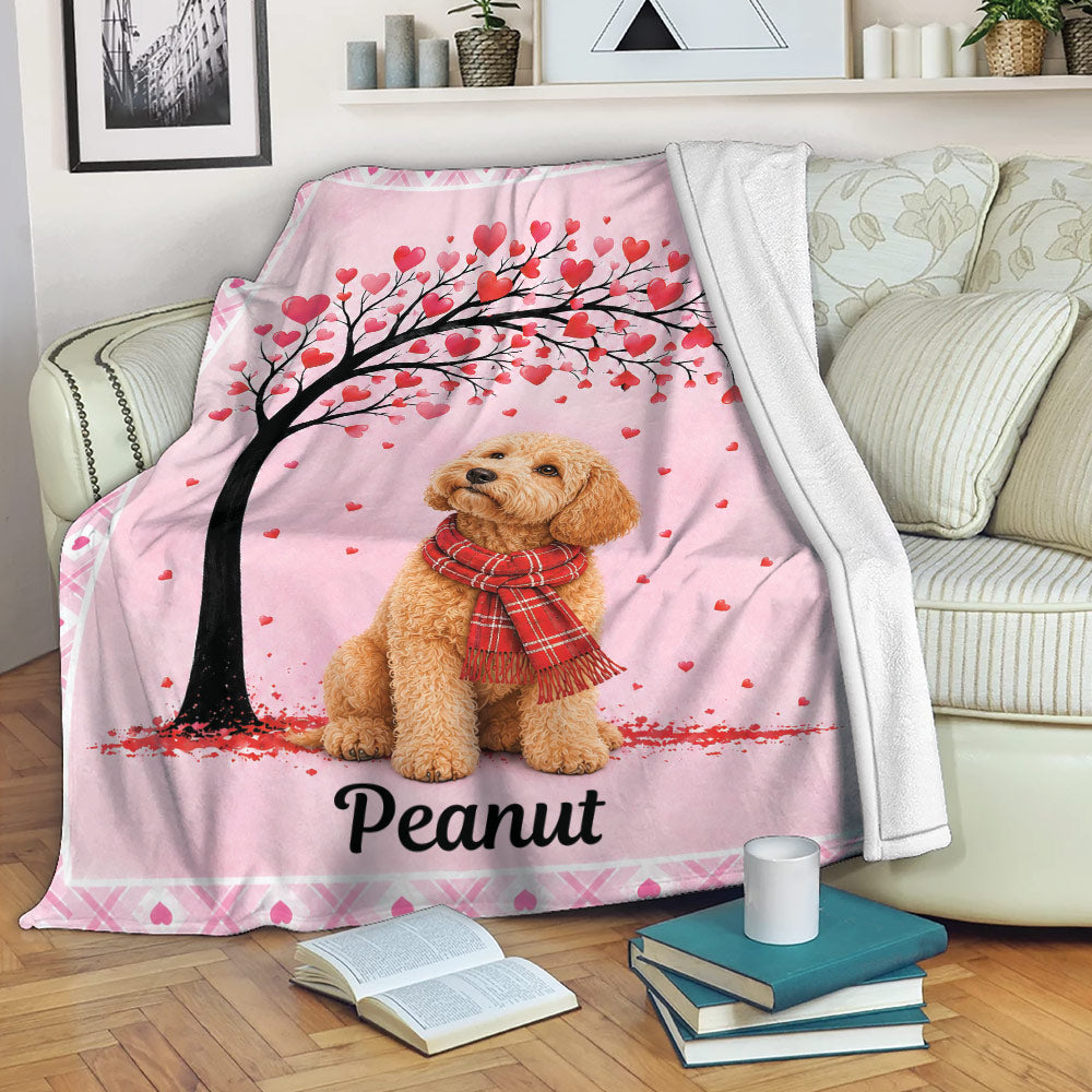 Goldendoodle blanket draped over a sofa with a heart tree design and pink border