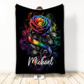 LGBT throw blanket featuring a colorful rainbow rose, pride ribbon, black background, and smoky rainbow accents